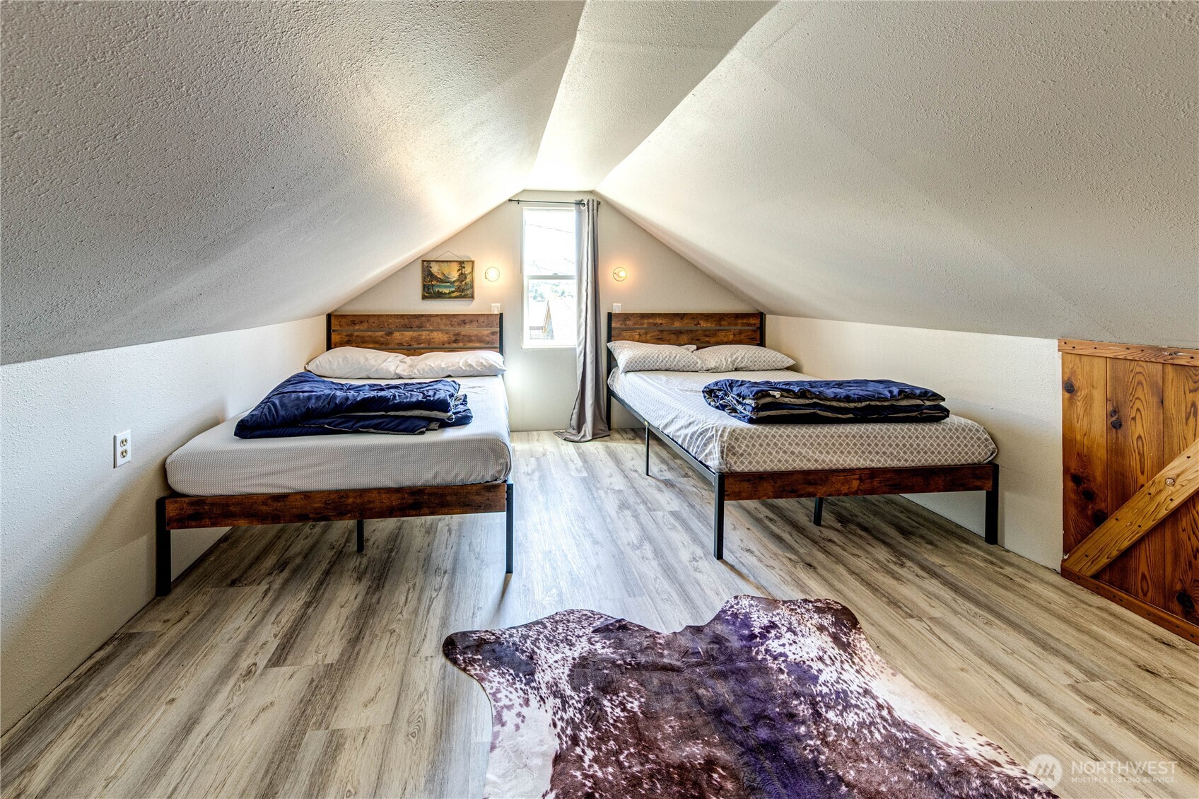 20 Smithville Road Beaver, WA 98305 - Photo 13 of 40 a living room with furniture and a wooden floor