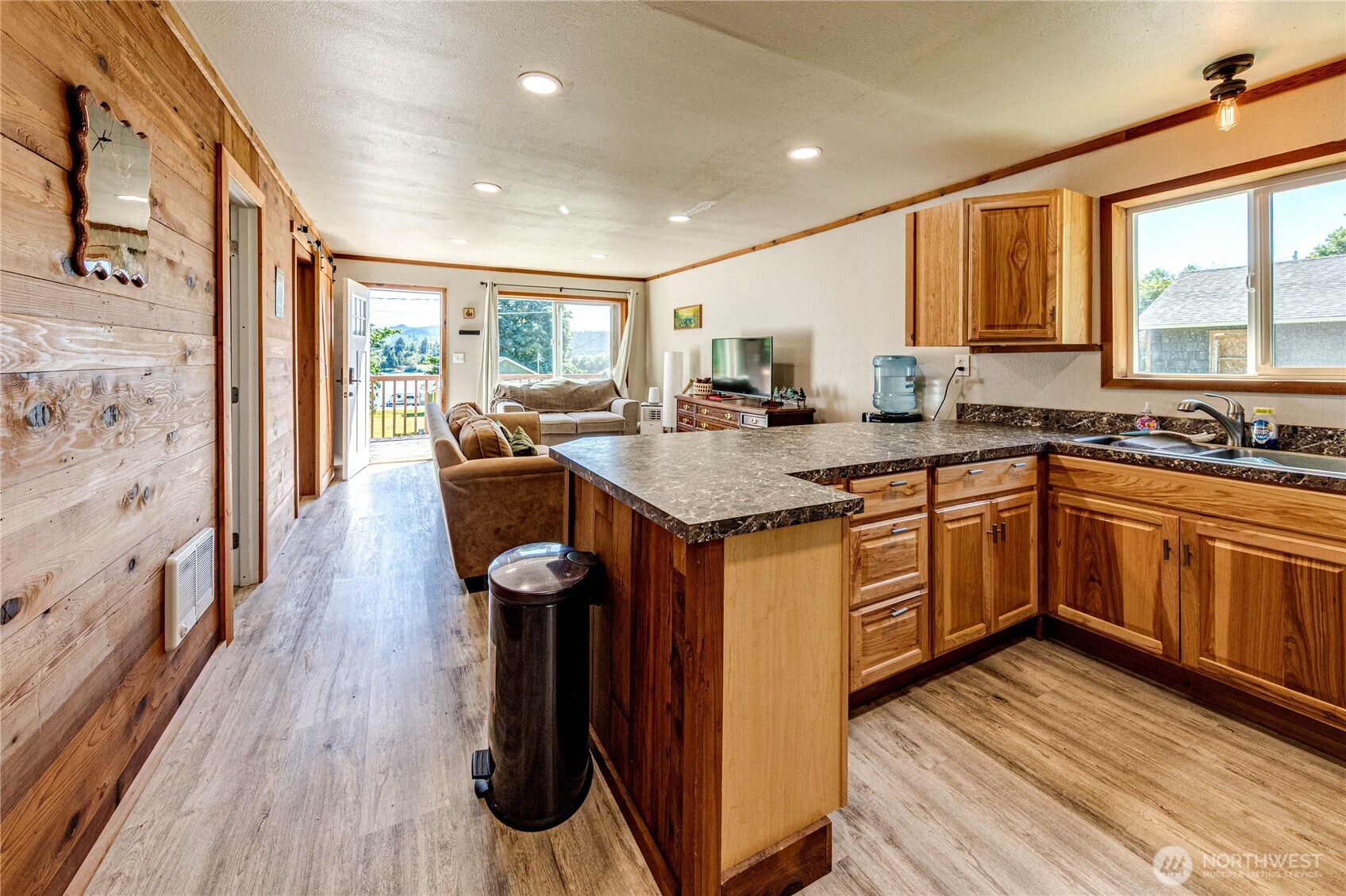 20 Smithville Road Beaver, WA 98305 - Photo 20 of 40 a kitchen with a sink stove and cabinets