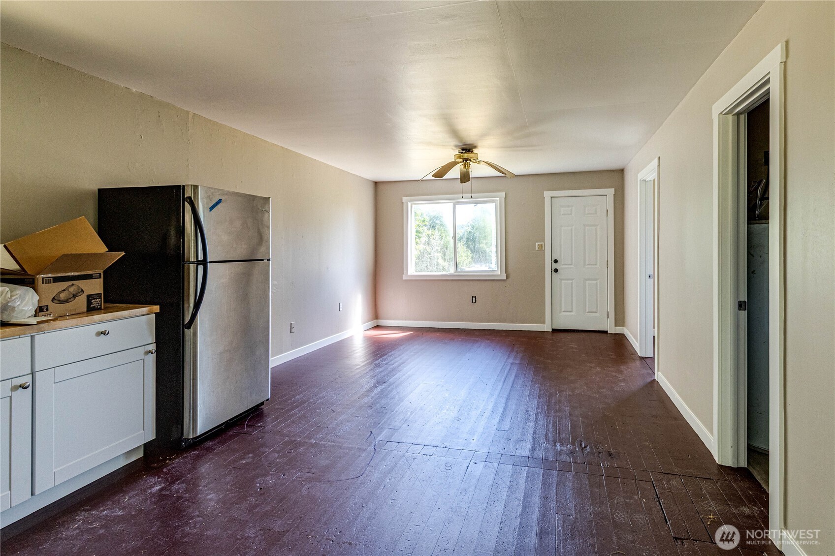 20 Smithville Road Beaver, WA 98305 - Photo 27 of 40 a view of empty room with wooden floor and fan