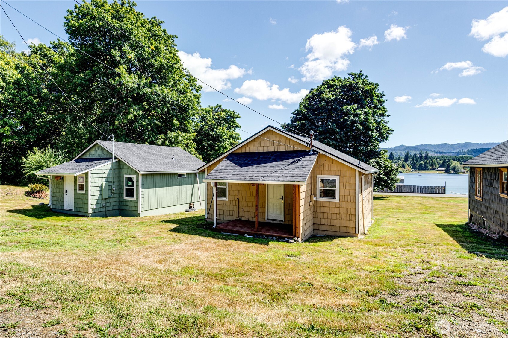 20 Smithville Road Beaver, WA 98305 - Photo 29 of 40 a view of a house with a yard