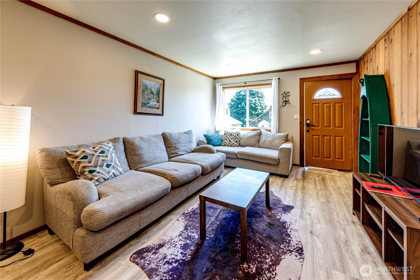 20 Smithville Road Beaver, WA 98305 - Photo 8 of 40 a living room with furniture and a flat screen tv