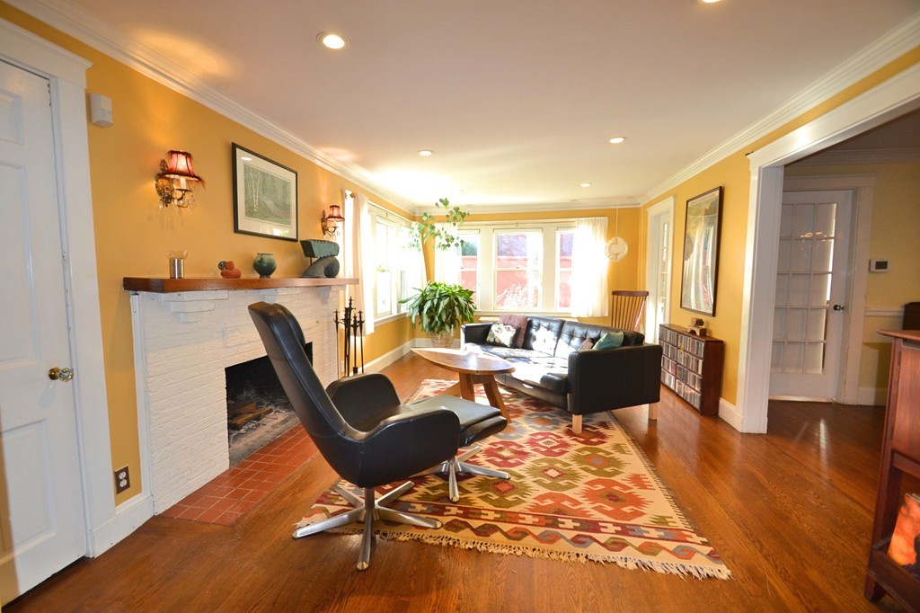 53 Arapahoe Road Newton, MA 02465 - Photo 11 of 25 a living room with furniture and a table