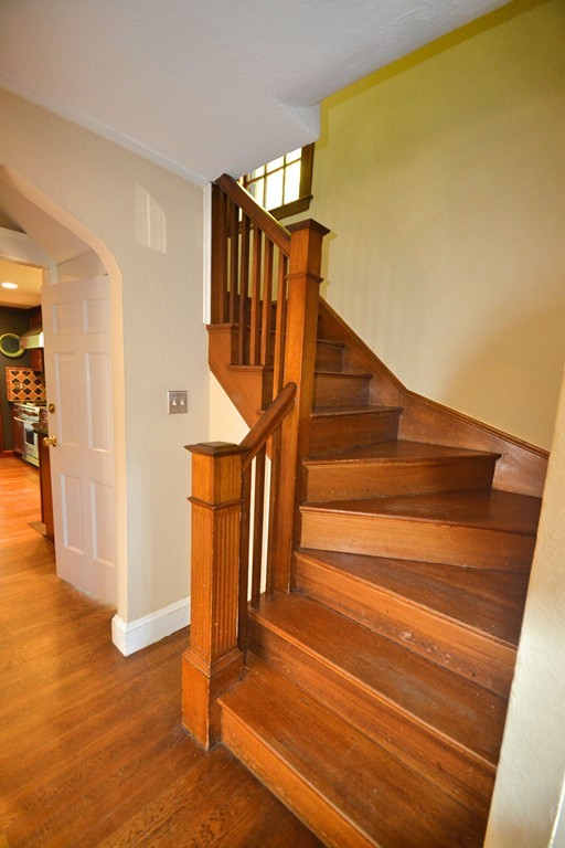 53 Arapahoe Road Newton, MA 02465 - Photo 14 of 25 a view of entryway and hall with wooden floor