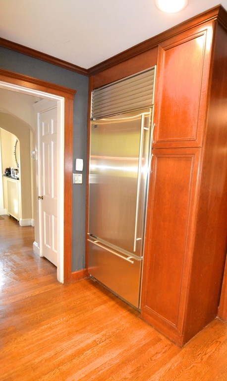 53 Arapahoe Road Newton, MA 02465 - Photo 5 of 25 a view of empty room with wooden floor