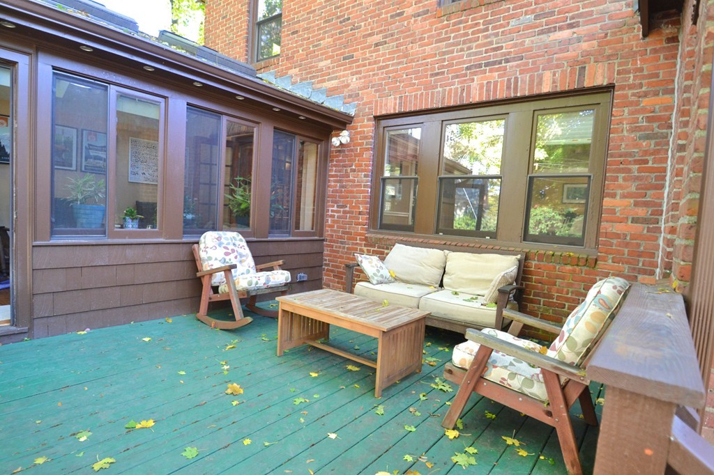 53 Arapahoe Road Newton, MA 02465 - Photo 9 of 25 a outdoor living space with furniture and a garden