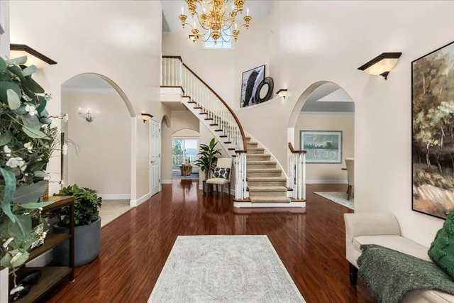 a kitchen with counter space dining table and chairs