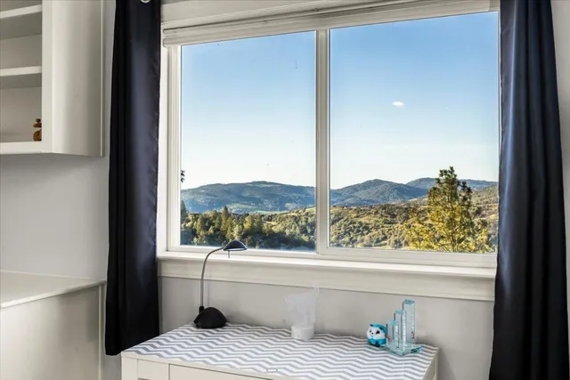 a utility room with refrigerator and washer