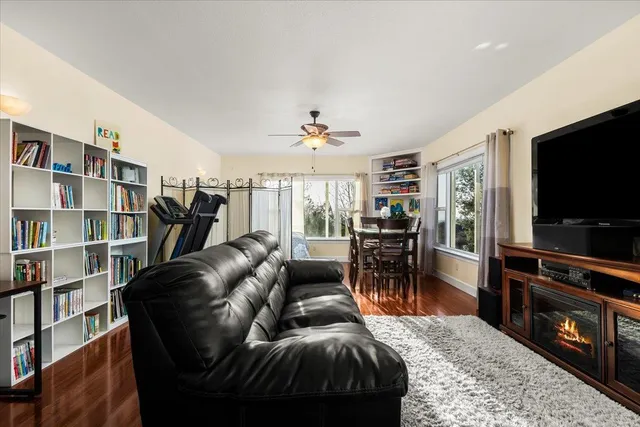 a view of a balcony with a forest