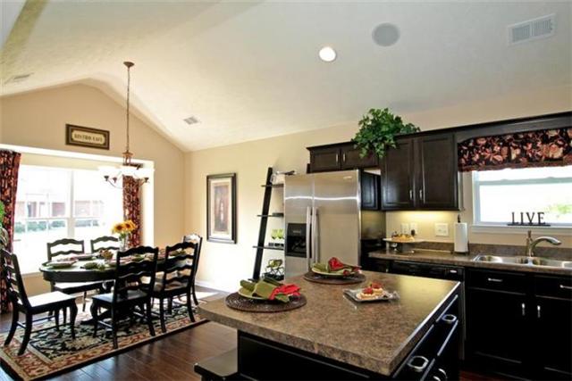 6029 Cane Springs Road Antioch, TN 37013 - Photo 5 of 7 a kitchen with granite countertop lots of counter top space and dining table