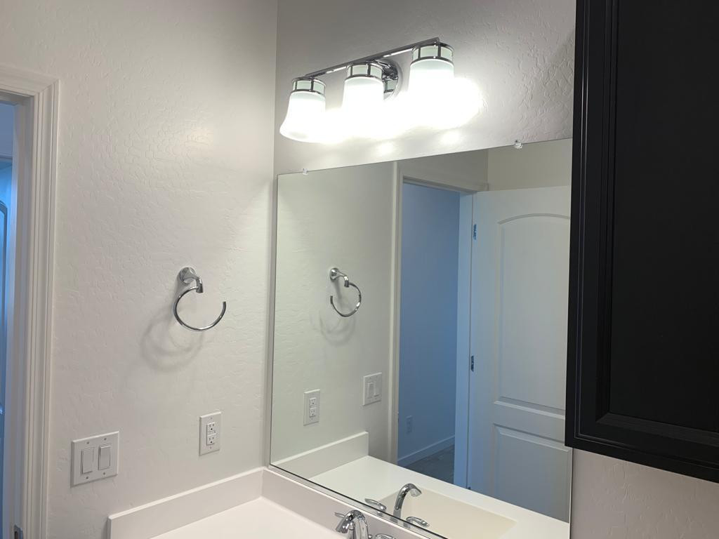 3900 East Baseline Road, Unit 118 Phoenix, AZ 85042 - Photo 8 of 32 a bathroom with a shower and a sink