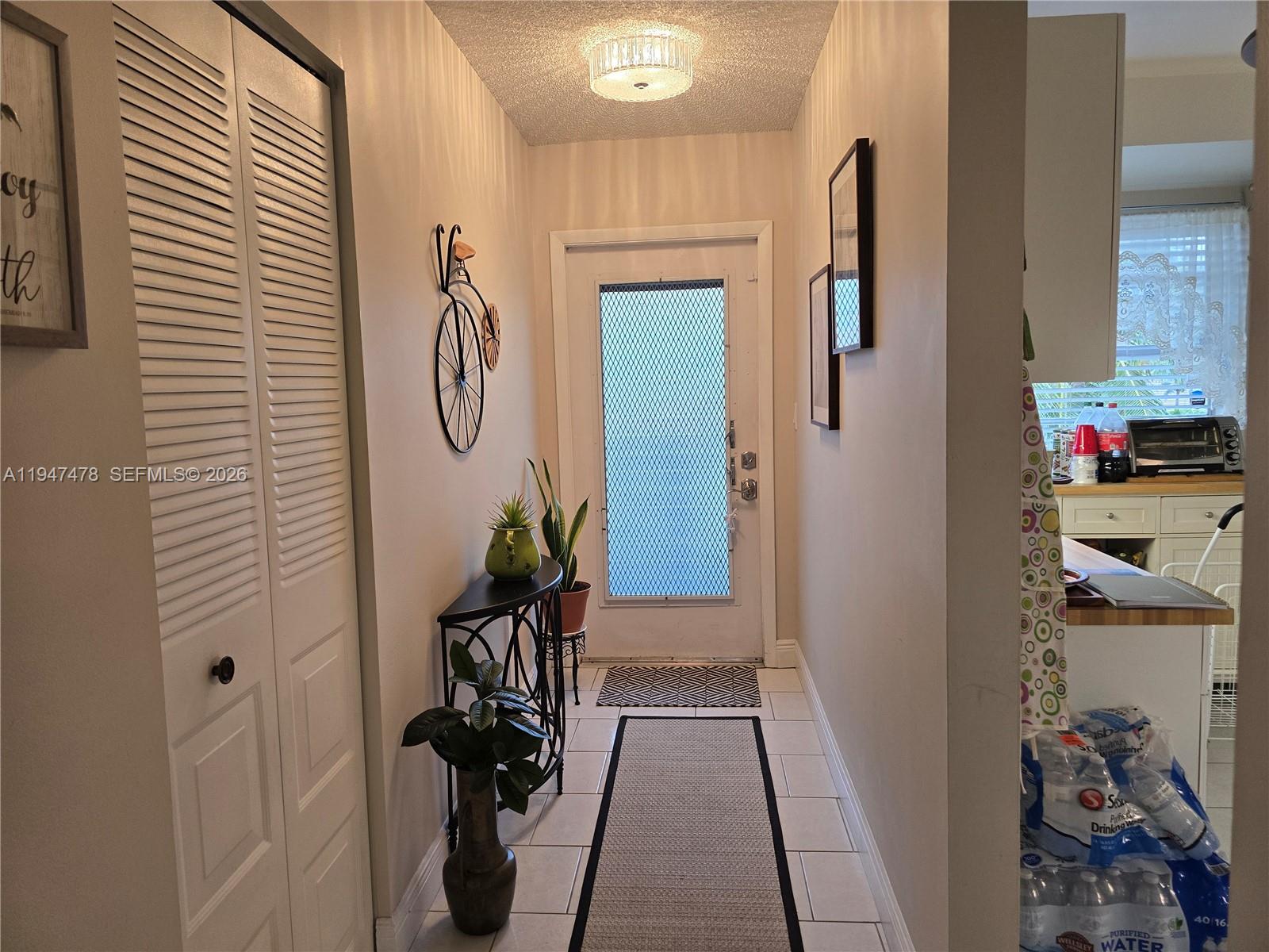 7690 Northwest 18th Street, Unit 306 Margate, FL 33063 - Photo 17 of 30 a view of walk in closet