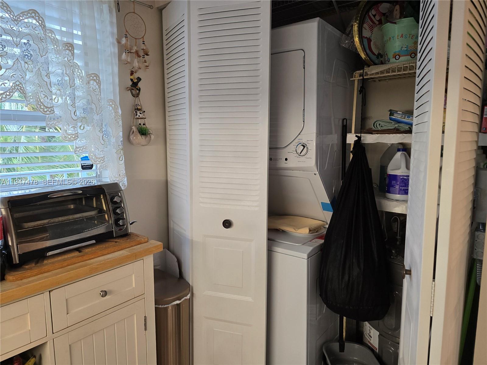 7690 Northwest 18th Street, Unit 306 Margate, FL 33063 - Photo 18 of 30 a close view of walk in closet