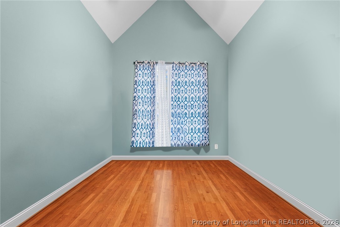 55 London Way Spring Lake, NC 28390 - Photo 11 of 43 a view of empty room with wooden floor and fan