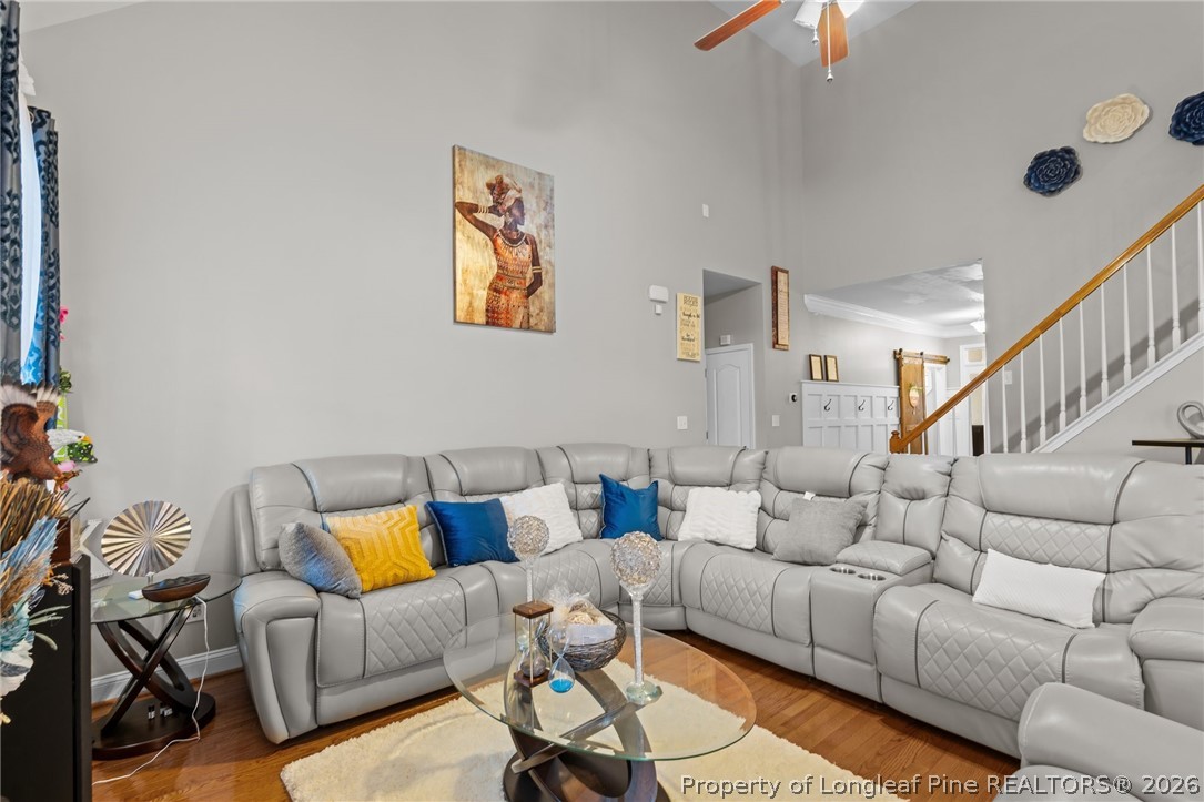 55 London Way Spring Lake, NC 28390 - Photo 16 of 43 a living room with furniture and a couch