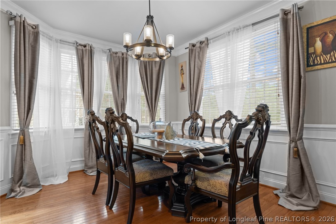 55 London Way Spring Lake, NC 28390 - Photo 19 of 43 a view of a dining room with furniture window and wooden floor