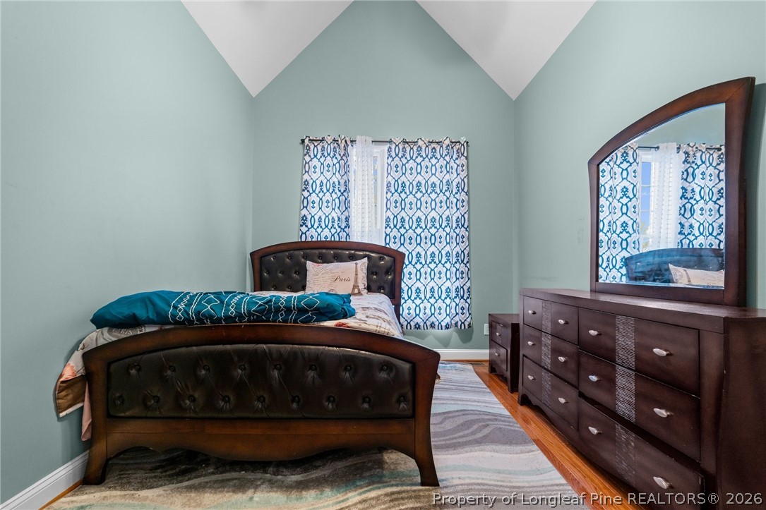 55 London Way Spring Lake, NC 28390 - Photo 10 of 43 a bedroom with a bed window and dresser