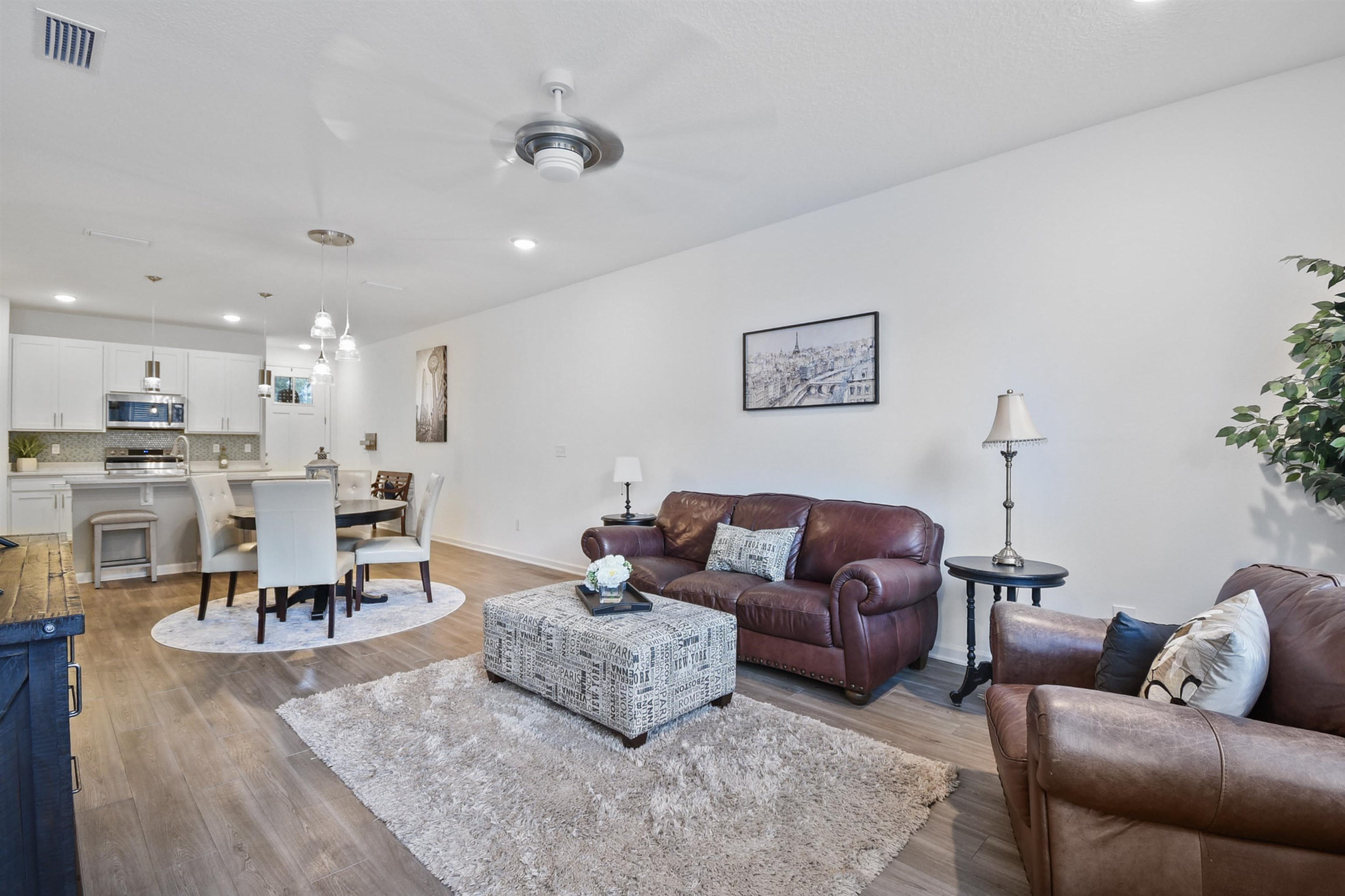 105 Ridge Lake Road St. Augustine, FL 32086 - Photo 14 of 34 a living room with furniture kitchen view and a table