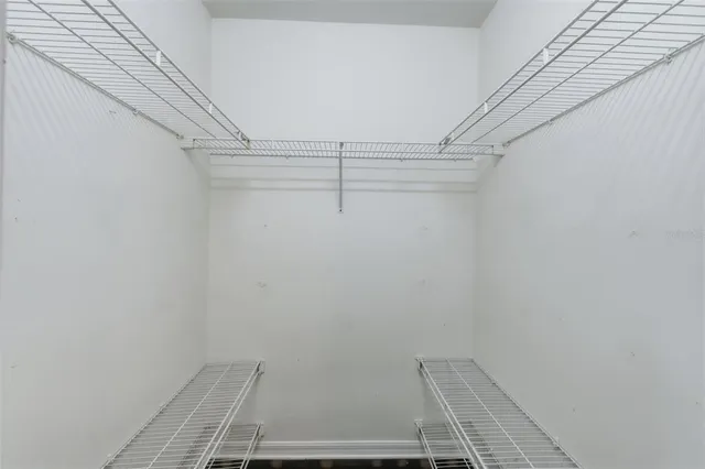 a view of an empty walk in closet