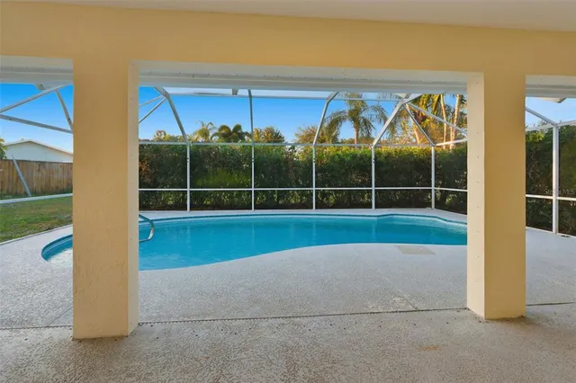 a view of a room with a large window