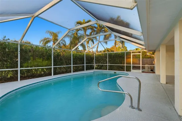 a view of a swimming pool with window