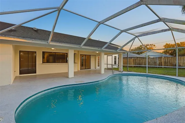 a view of a backyard of a house