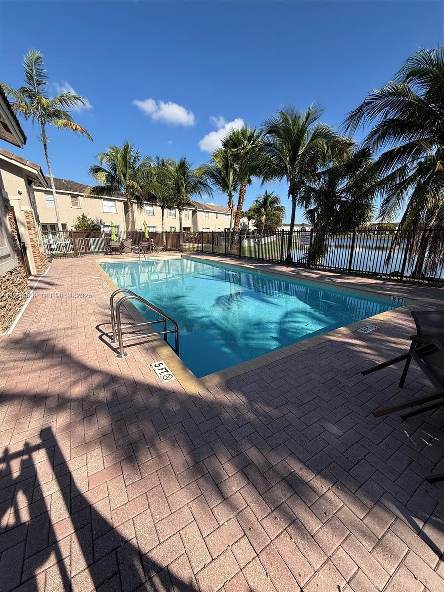 904 Southwest 154th Path Miami, FL 33194 - Photo 16 of 18 a view of a park with many windows