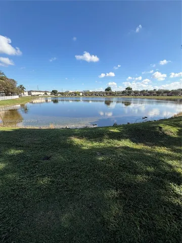a view of a lake from a yard