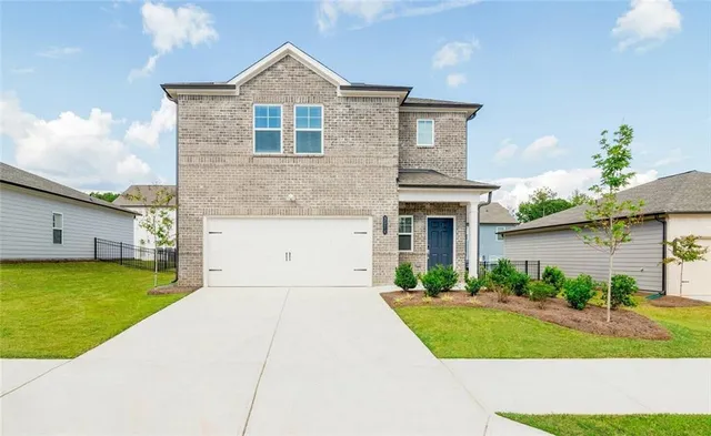 a front view of house with yard