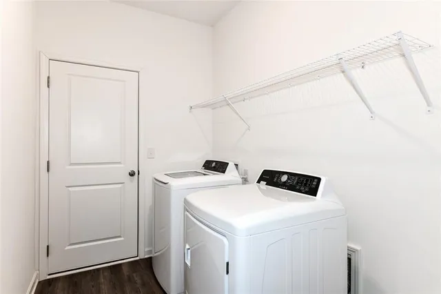 a utility room with dryer and washer