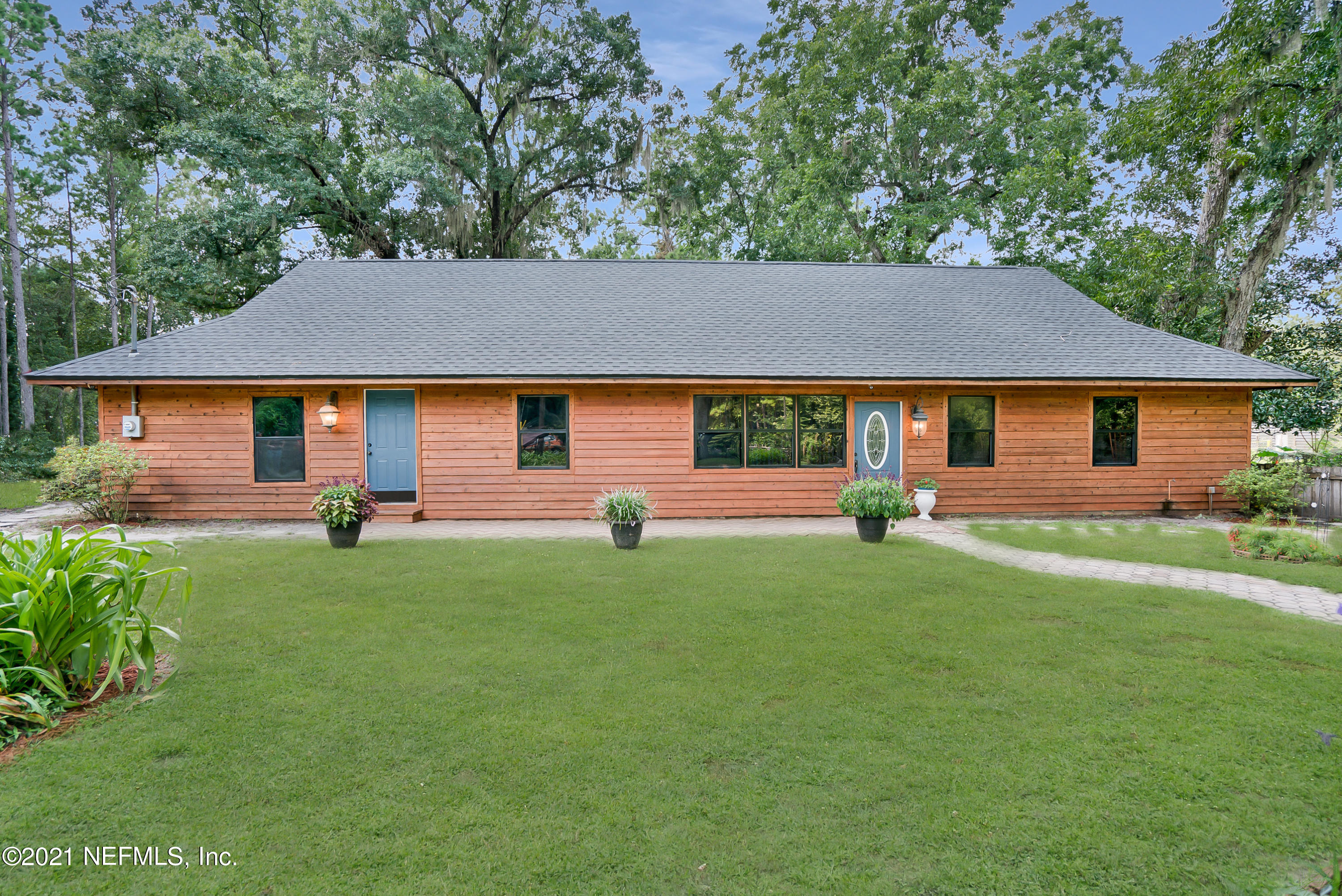 444 George Mosley Road Jacksonville, FL 32234 - Photo 1 of 58 a view of house with backyard