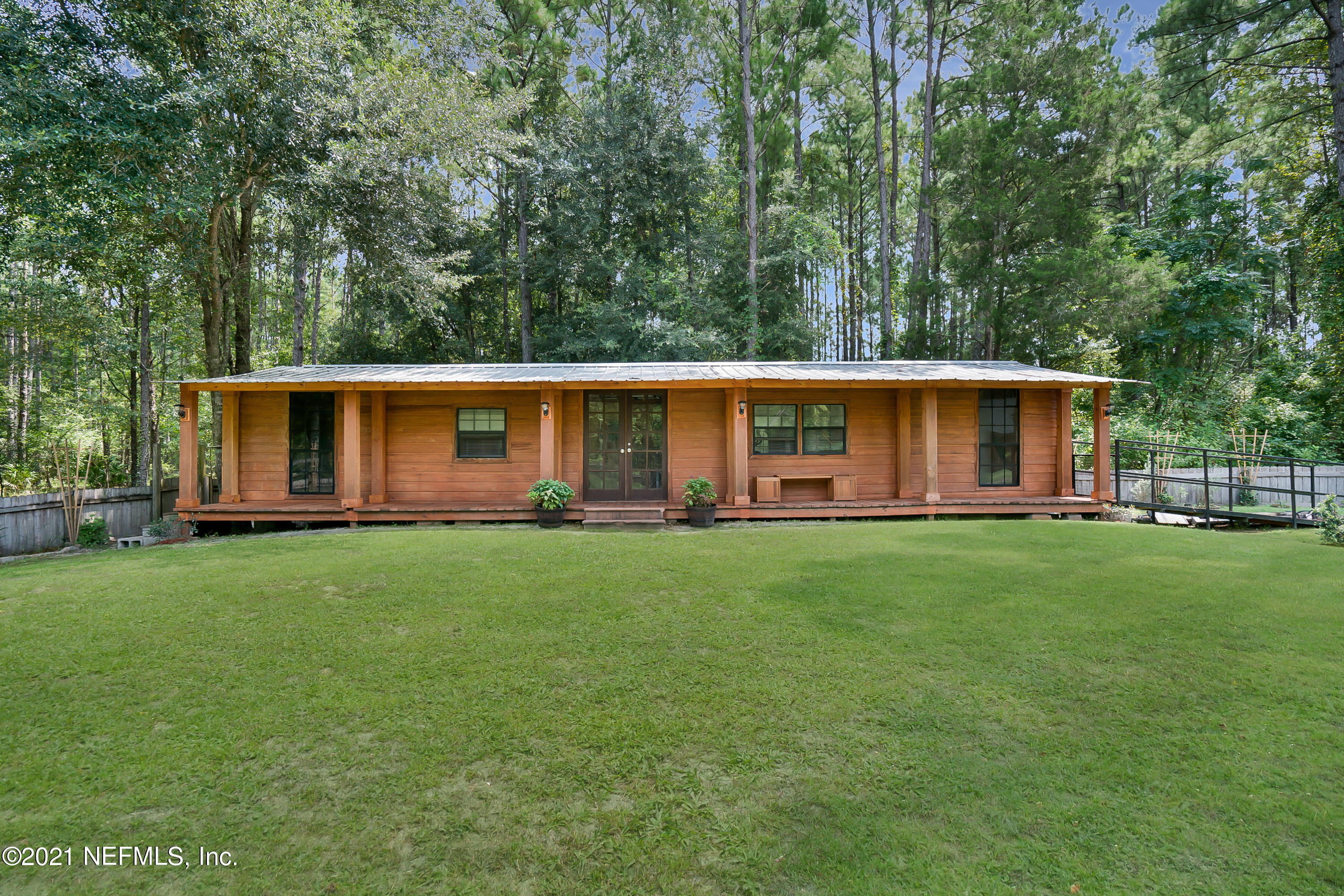 444 George Mosley Road Jacksonville, FL 32234 - Photo 38 of 58 a view of an house with backyard space and balcony