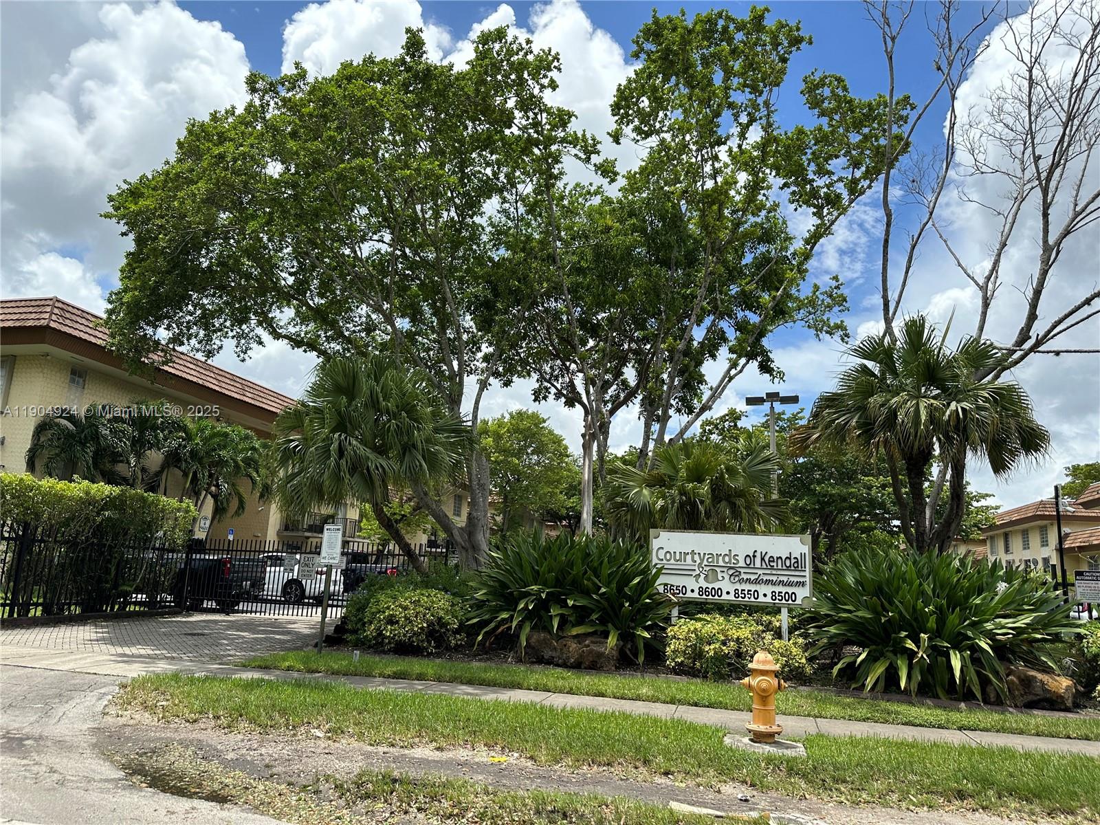 8600 Southwest 109th Avenue, Unit 4211 Miami, FL 33173 - Photo 1 of 25 a view of a house with backyard and a tree