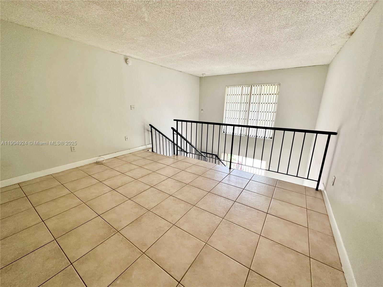 8600 Southwest 109th Avenue, Unit 4211 Miami, FL 33173 - Photo 11 of 25 a view of a room with windows