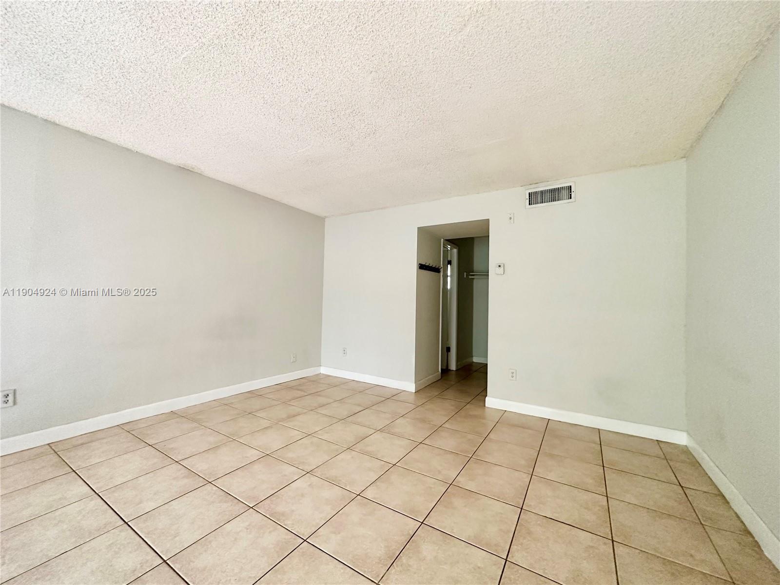 8600 Southwest 109th Avenue, Unit 4211 Miami, FL 33173 - Photo 16 of 25 a view of an empty room
