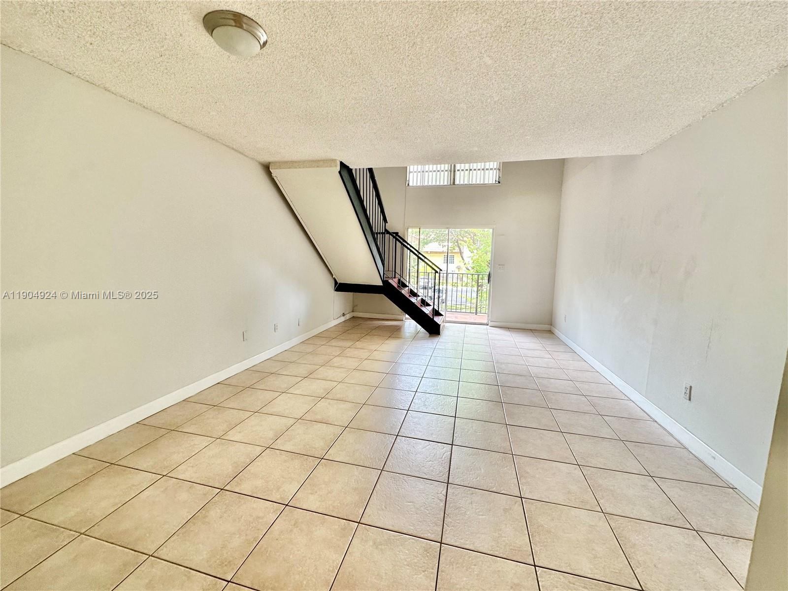 8600 Southwest 109th Avenue, Unit 4211 Miami, FL 33173 - Photo 23 of 25 a view of an empty room