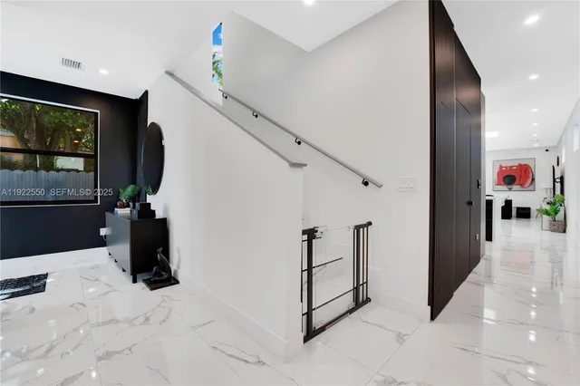 a view of a hallway with entryway