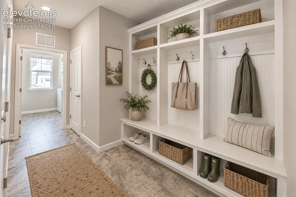 1306 Promontory Bluff View Colorado Springs, CO 80921 - Photo 11 of 39 Virtually staged mud room