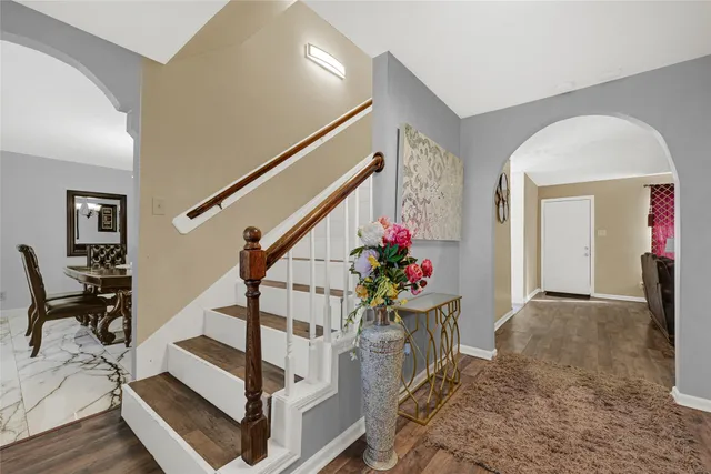 a view of entryway livingroom and hall