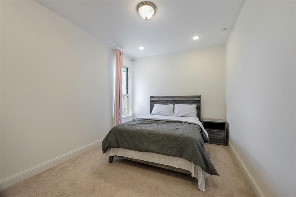 3603 Scotsman Road Sachse, TX 75048 - Photo 18 of 33 a bedroom with a bed and a window