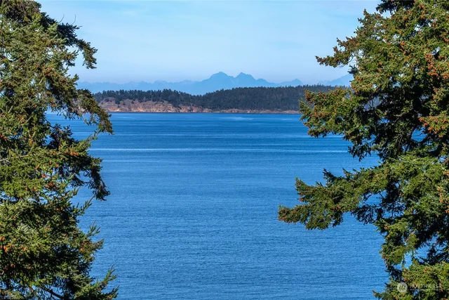 a view of mountain with sunset view