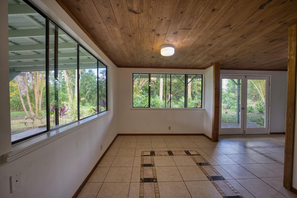 17-406 13 Mile Road Kurtistown, HI 96749 - Photo 17 of 29 a view of an empty room with a window
