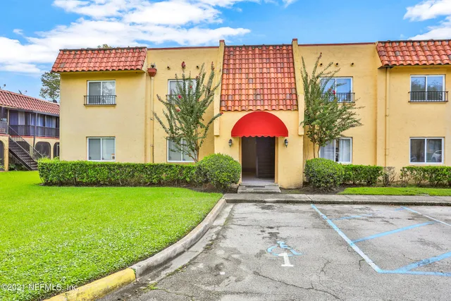 a view of a house with garden