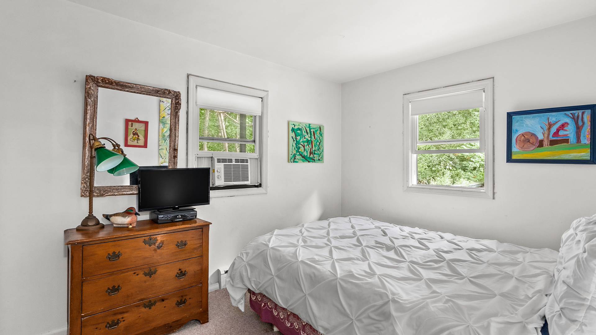 11 Shoridge East Hampton, NY 11937 - Photo 13 of 14 a bedroom with a bed and a window