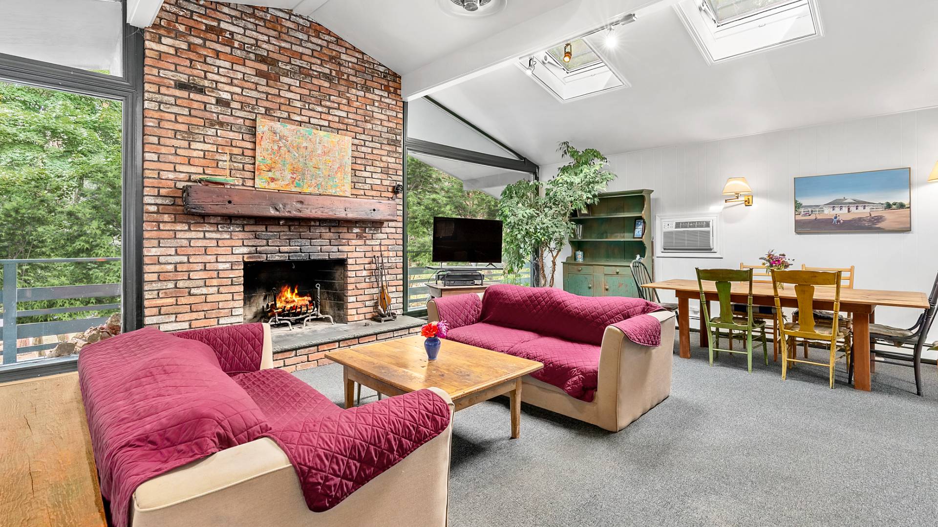 11 Shoridge East Hampton, NY 11937 - Photo 6 of 14 a living room with furniture or outdoor view and a fireplace