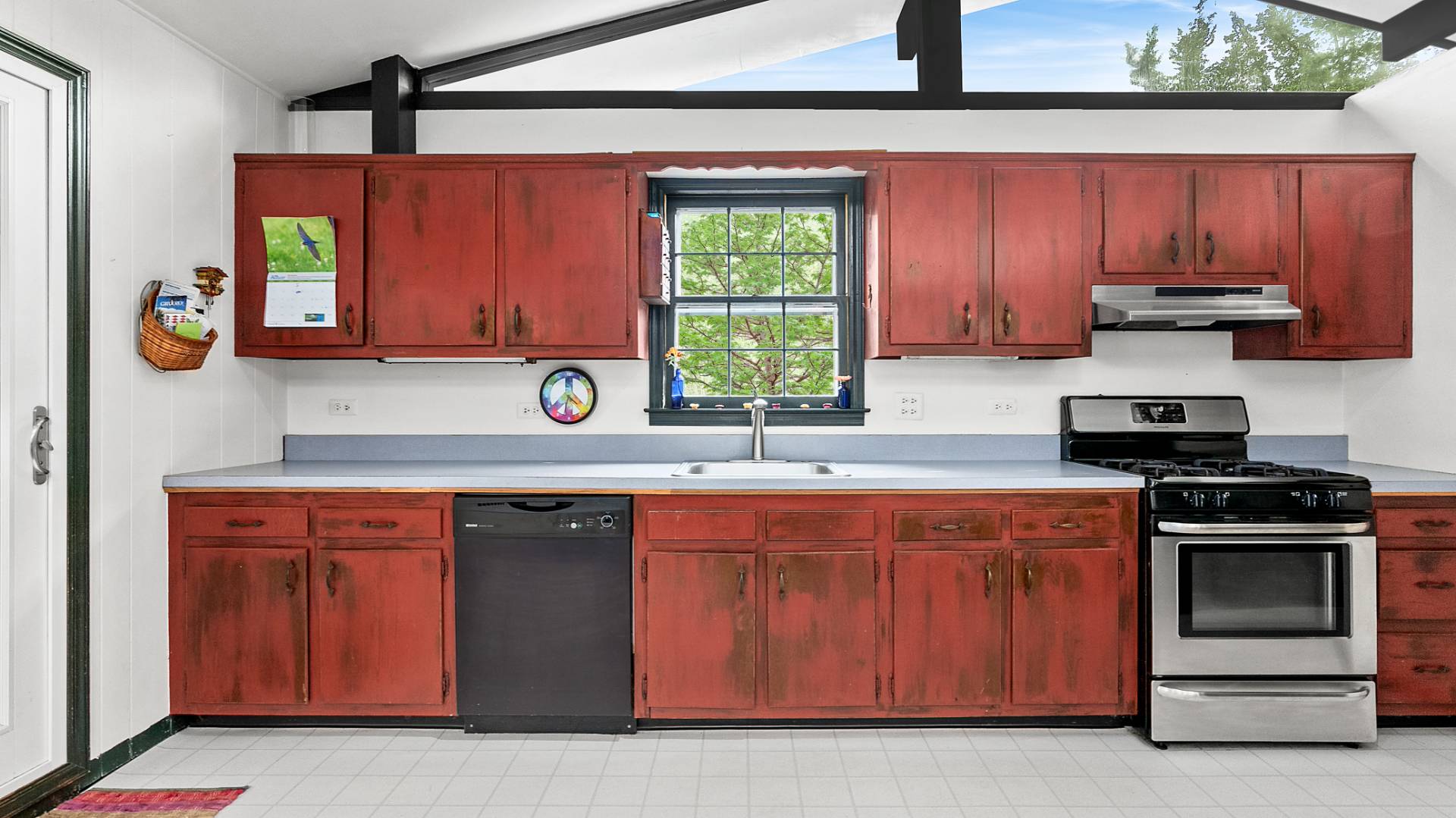 11 Shoridge East Hampton, NY 11937 - Photo 8 of 14 a kitchen with stainless steel appliances granite countertop a stove a sink and a microwave