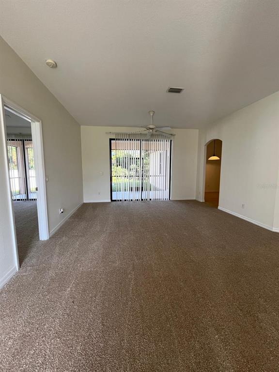 4458 Maverick Street North Port, FL 34288 - Photo 2 of 8 a view of an empty room with a window