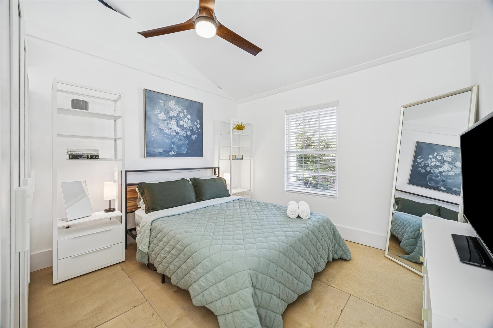 213 Lessin Lane Austin, TX 78704 - Photo 14 of 16 Bedroom with ceiling fan, lofted ceiling, and ornamental molding