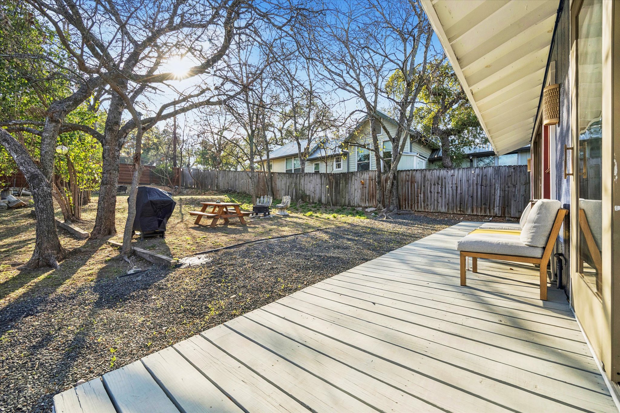 213 Lessin Lane Austin, TX 78704 - Photo 5 of 16 Deck with a fenced backyard