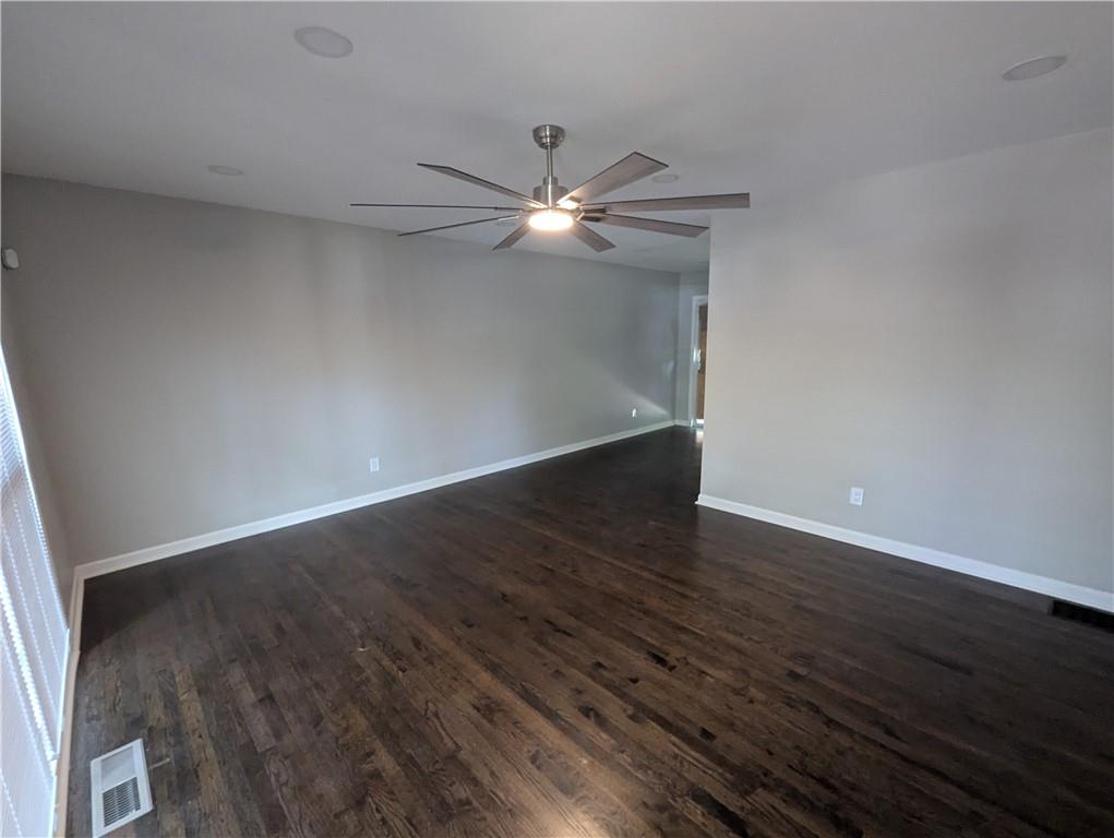 4308 Sheppard Drive Conley, GA 30288 - Photo 2 of 11 a view of an empty room with wooden floor