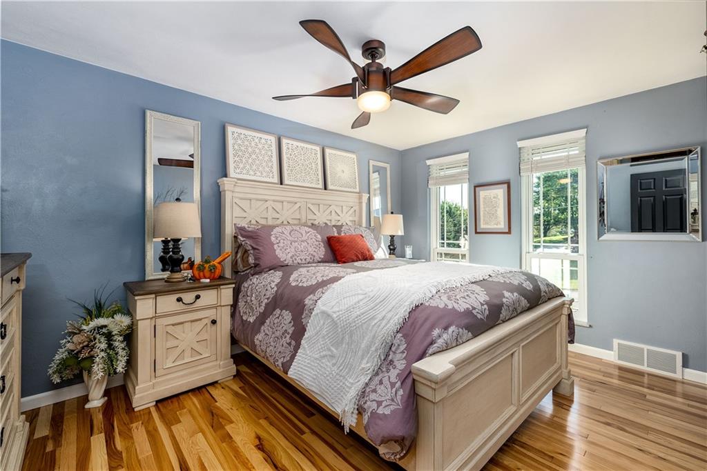 17 Parkcrest Drive Cecil, PA 15321 - Photo 15 of 25 a bedroom with a large bed and a large window